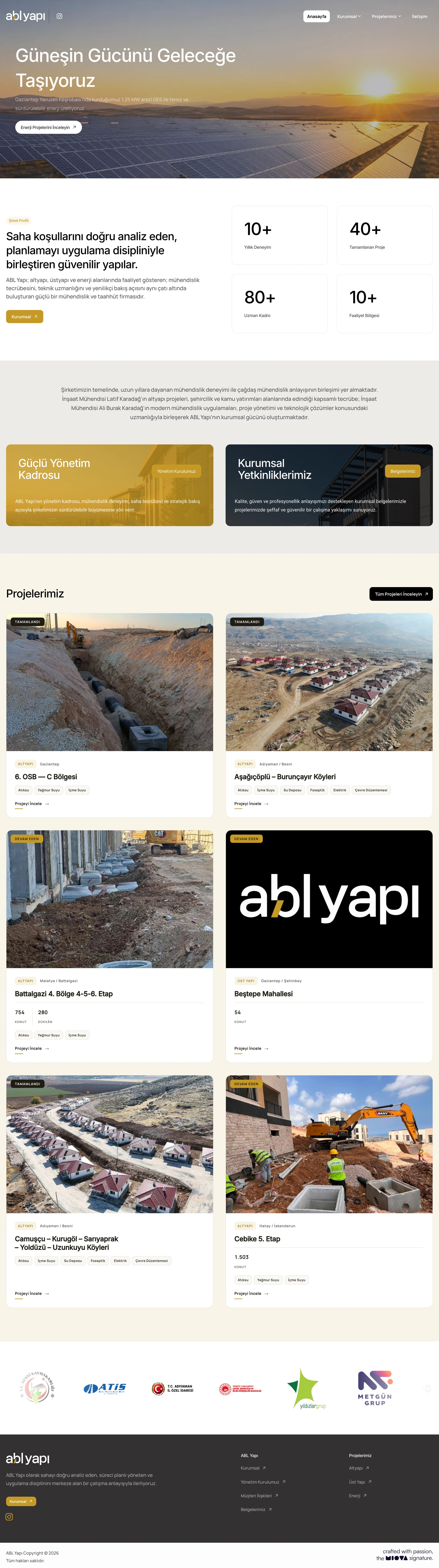 The full ABL Yapı homepage: a solar energy opening, company profile and figures, management and certificates, project cards with location, status and scope, and partners