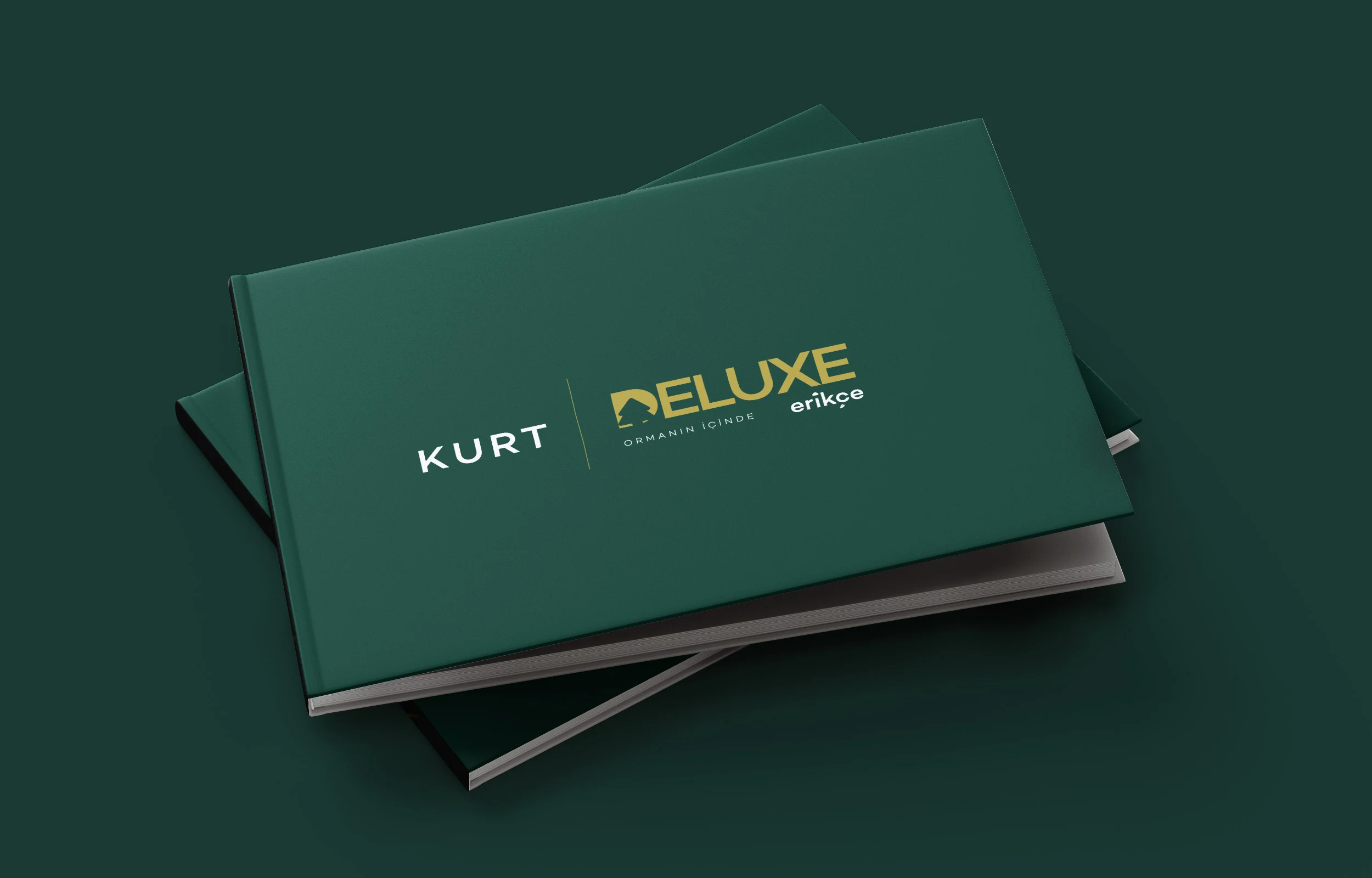 Two stacked landscape catalogs with the Kurt Deluxe Erikçe logo on their deep green covers